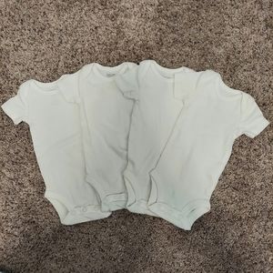 4 Solid White Bodysuits